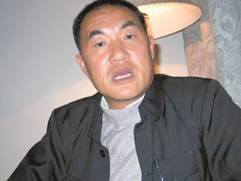 刘银昌的最终目标--要让农家狗不咬(图)