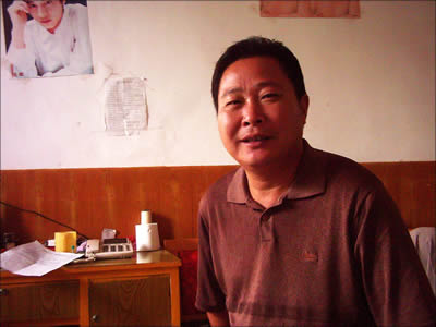 【人物简介(06)】何红仿:乡干部累死岗位上(图