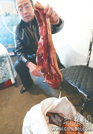 肉贩腌母猪肉出卖 煮不烂情知理亏退买肉钱(图)