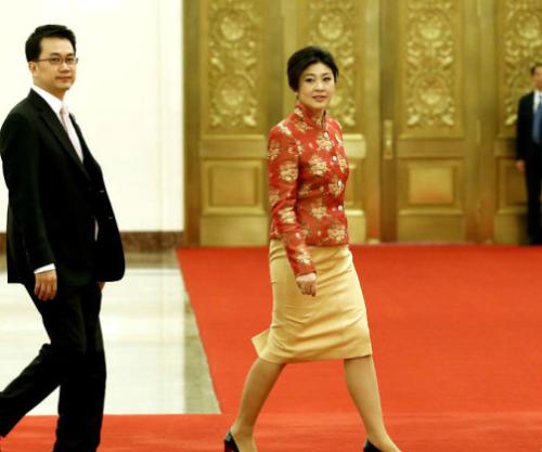 泰国美女总理私房照成名之路临阵受命替兄出征