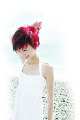 孙燕姿新造型"红发小精灵"(图)