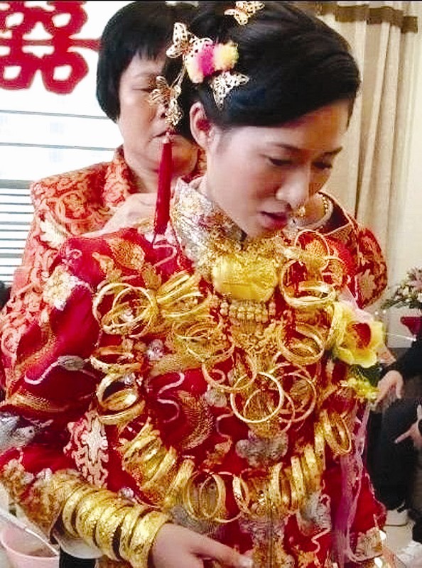 泉州现黄金新娘 出嫁佩戴10斤金饰(图)